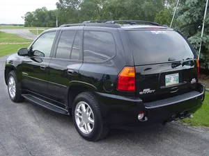 Stunning Gmc Envoy On The Road Wallpaper
