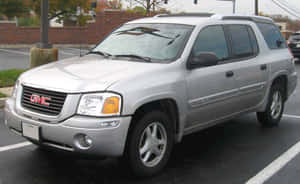 Stunning Gmc Envoy On The Road Wallpaper