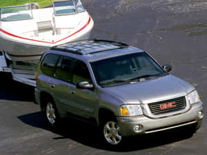 Stunning Gmc Envoy On The Road Wallpaper