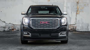 Stunning Gmc Yukon In Scenic Surroundings Wallpaper