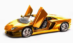 “stunning Gold Lamborghini Supercar.” Wallpaper