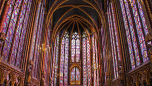 Stunning Gothic Architecture Featuring A Cathedral And Cityscape Wallpaper