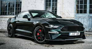 Stunning Green Ford Mustang Bullitt On The Open Road Wallpaper