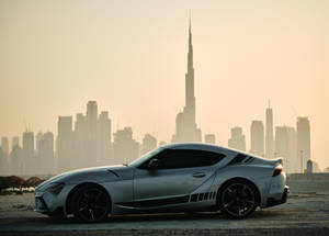 Stunning Grey 4k Toyota Supra With Black Detailing Wallpaper