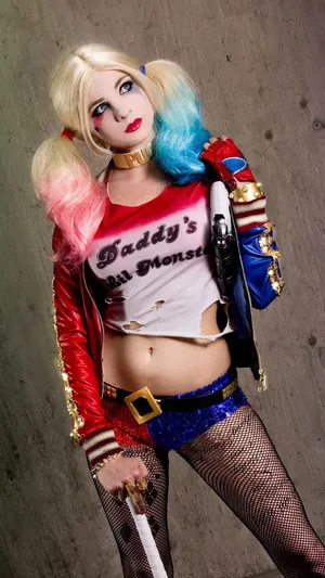 Stunning Harley Quinn Cosplay In Action Wallpaper