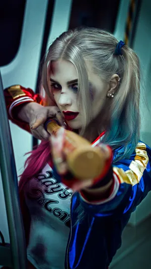 Stunning Harley Quinn Cosplay In Action Wallpaper