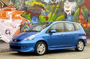 Stunning Honda Fit In Urban Setting Wallpaper