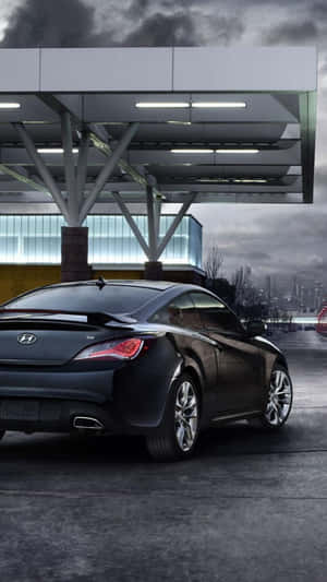 Stunning Hyundai Genesis Cruising On The Road Wallpaper