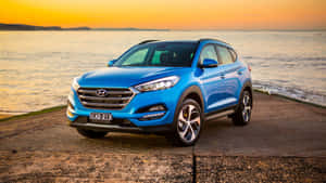 Stunning Hyundai Tucson In Scenic Landscape Wallpaper