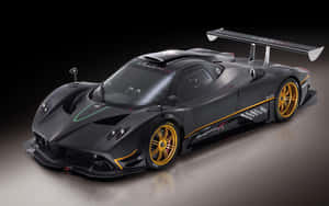 Stunning Image Of The Iconic Pagani Zonda F Against A Striking Scenic Background Wallpaper