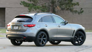 Stunning Infiniti Qx70 In Vibrant City Surroundings Wallpaper
