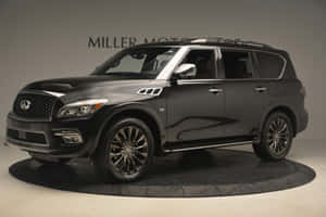 Stunning Infiniti Qx80 Luxury Suv In Motion Wallpaper