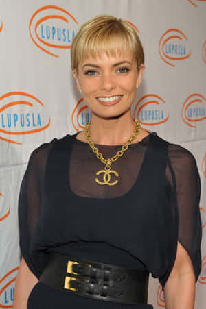 Stunning Jaime Pressly Posing In An Elegant Outfit Wallpaper