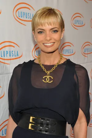 Stunning Jaime Pressly Posing In An Elegant Outfit Wallpaper
