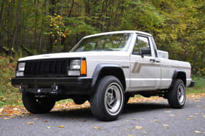 Stunning Jeep Comanche In A Rugged Off-road Adventure Wallpaper