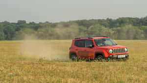 Stunning Jeep Renegade In A Picturesque Landscape Wallpaper