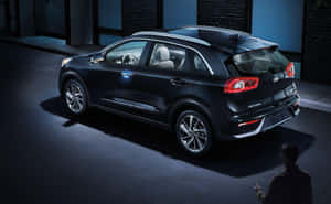 Stunning Kia Niro Electric Vehicle On The Road Wallpaper