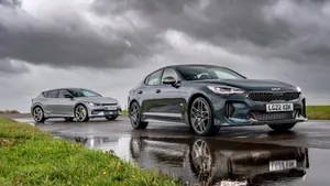 Stunning Kia Stinger Sports Sedan In Action Wallpaper