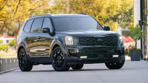 Stunning Kia Telluride In Scenic Landscape Wallpaper