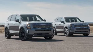 Stunning Kia Telluride On A Scenic Road Wallpaper