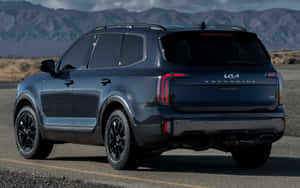 Stunning Kia Telluride On An Open Road Wallpaper