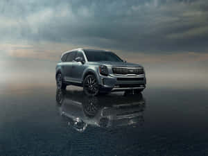 Stunning Kia Telluride On Scenic Road Trip Wallpaper