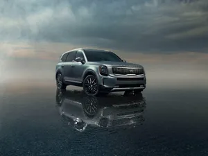 Stunning Kia Telluride On Scenic Road Trip Wallpaper