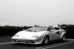 Stunning Lamborghini Countach In Vibrant Red Wallpaper