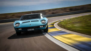 Stunning Lamborghini Miura In Action Wallpaper