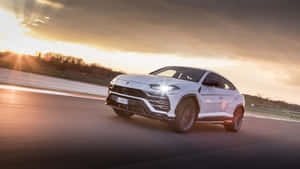 Stunning Lamborghini Urus In Action Wallpaper