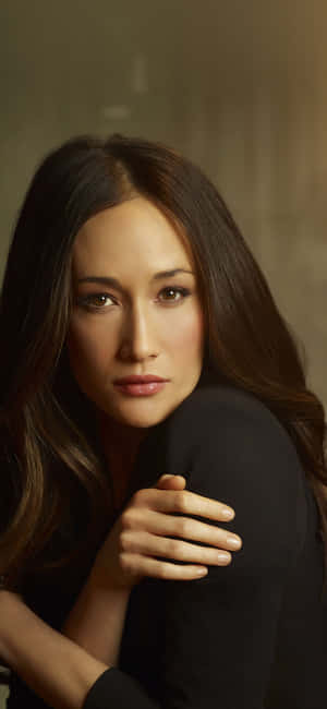 Stunning Maggie Q Posing Elegantly Wallpaper