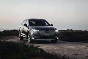 Stunning Mazda Cx-9 In Scenic Setting Wallpaper