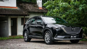 Stunning Mazda Cx-9 On The Road Wallpaper