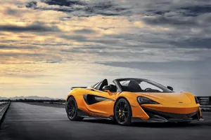 Stunning Mclaren 600lt In Motion Wallpaper