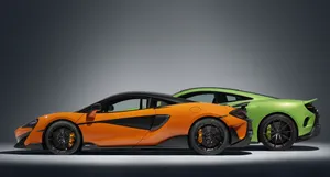 Stunning Mclaren 600lt Racing On The Track Wallpaper