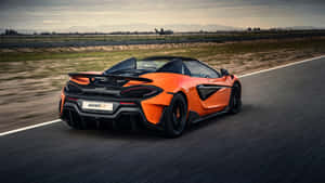 Stunning Mclaren 600lt Spider In Motion Wallpaper