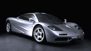 Stunning Mclaren F1 In Motion Wallpaper