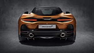 Stunning Mclaren Gt On The Open Road Wallpaper