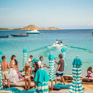 Stunning Mediterranean Beach At Sunset Wallpaper