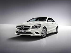 Stunning Mercedes Benz Cla-class On A Road Wallpaper