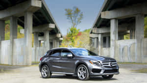 Stunning Mercedes-benz Gla-class Against A Picturesque Mountain Backdrop Wallpaper