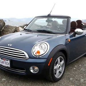 Stunning Mini Cooper Convertible On The Road Wallpaper