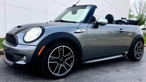 Stunning Mini Cooper S Convertible Enjoying A Sunny Drive Wallpaper