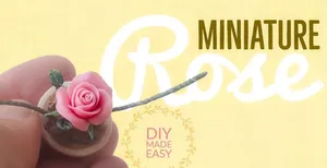 Stunning Miniature Roses In Full Bloom Wallpaper