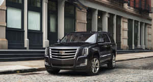 Stunning New Cadillac Escalade On A Scenic Route Wallpaper