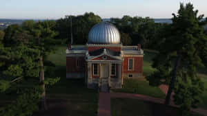 Stunning Observatory Under A Starlit Sky Wallpaper