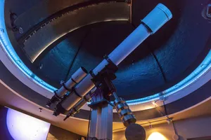 Stunning Observatory Under Starry Night Sky Wallpaper