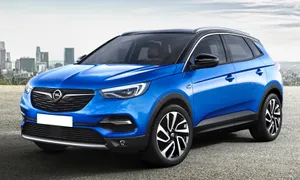 Stunning Opel Grandland X In Action On Scenic Road Wallpaper