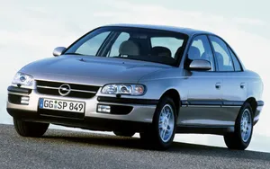 Stunning Opel Omega Cruising On The Open Road Wallpaper
