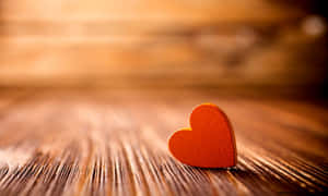 Stunning Orange Heart Vibrantly Glowing Wallpaper
